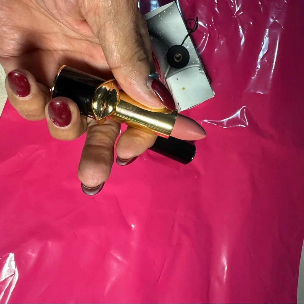 Luxurious Lipstick by PatMcgrath with Gold Accent in shade 020 Femmebot.